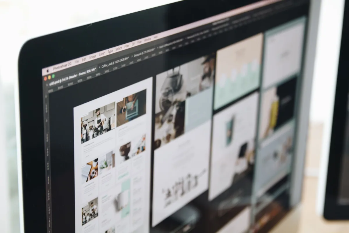 Modern responsive web design displayed on multiple devices in a professional workspace